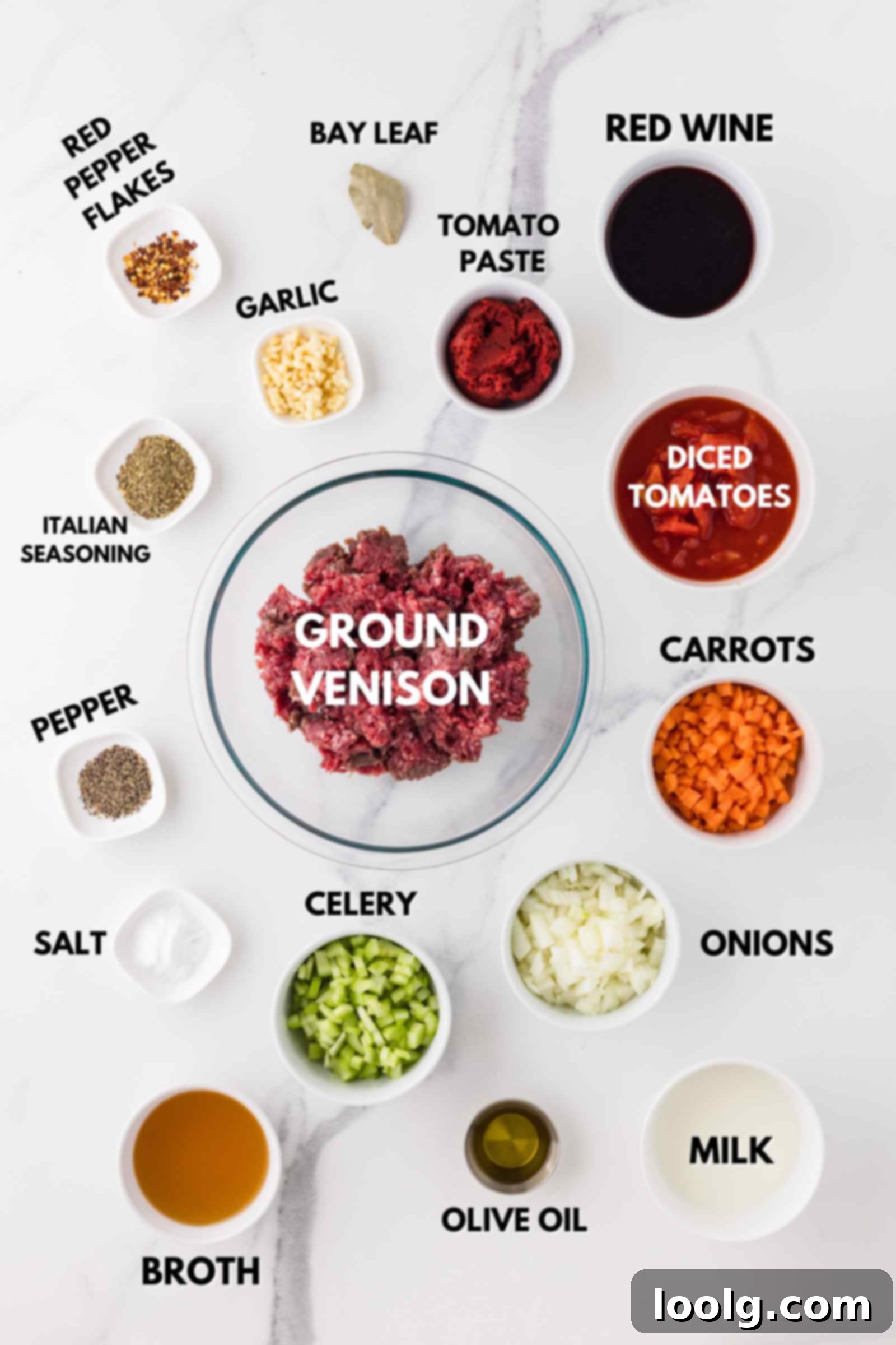 Slow-Simmered Venison Bolognese 4 all ingredients displayed that are needed to make venison bolognese