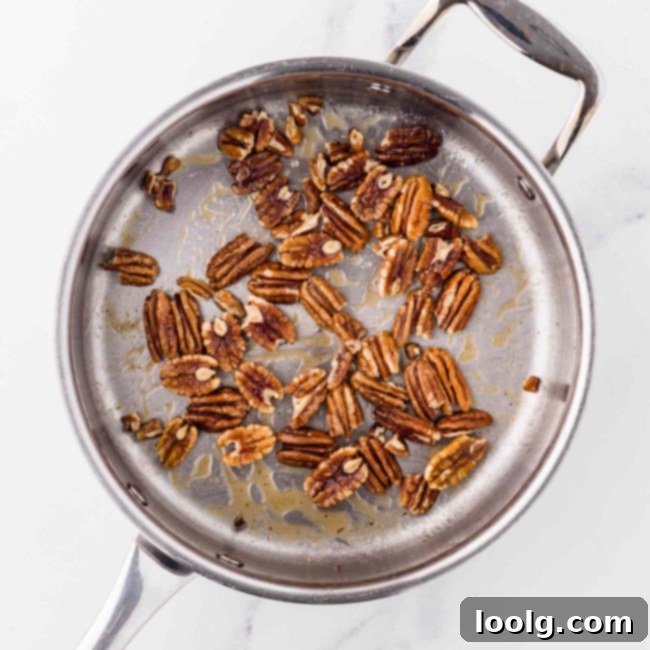 Artisan Goat Cheese Salad 4 toasting pecans in a pan