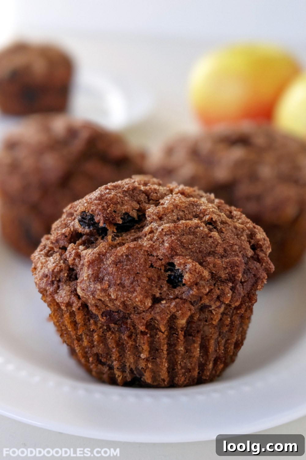 Wholesome Applesauce Muffins 4 A beautifully arranged plate of healthy applesauce muffins, highlighting their golden-brown tops and inviting aroma.