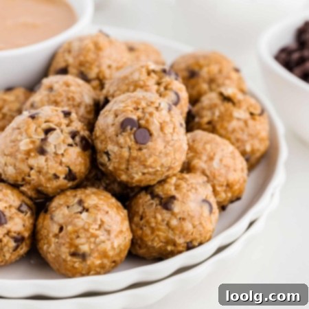 No-Bake Peanut Butter Oatmeal Energy Bites 8 peanut butter oatmeal balls on a white plate