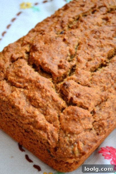 Wholesome Whole Wheat Chocolate Chip Banana Bread Moist and delicious whole wheat chocolate chip banana bread loaf, sliced and ready to enjoy.
