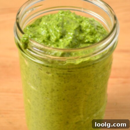Vibrant Spinach Pesto 1 Freshly made green spinach pesto in a bowl