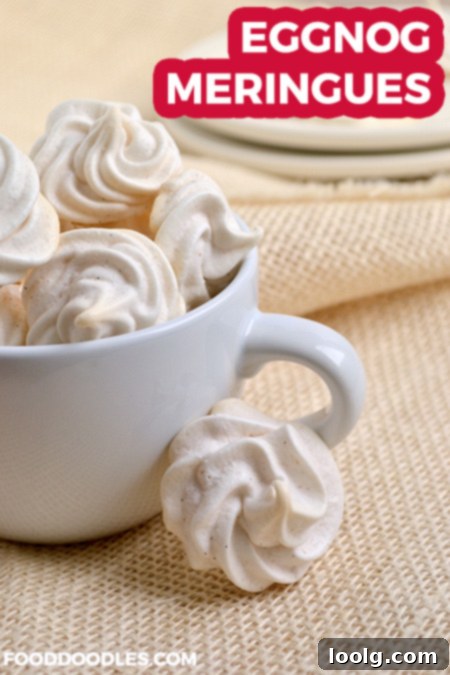 Holiday Eggnog Meringues 1 Fluffy Eggnog Meringues on a baking sheet, ready to be enjoyed