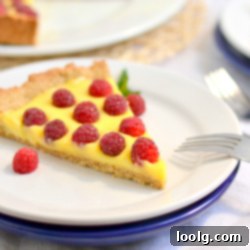 Velvety Honey Lemon Raspberry Curd Tart on a Wholesome Cookie Base 1 A beautiful Raspberry Honey Lemon Curd Tart with Whole Wheat Cookie Crust