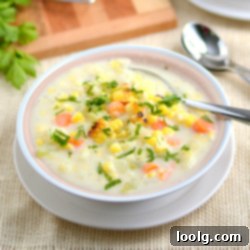 Velvety Plant-Based Roasted Corn Chowder 1 Creamy Vegetarian Roasted Corn Chowder ready to be served