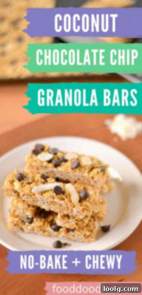 Chewy Coconut Chocolate Chip Granola Bars 1 Hand holding a coconut chocolate chip granola bar, showcasing its chewy texture and delicious ingredients.