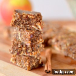 Apple Pie Bliss Bites 1 Overhead shot of freshly made Apple Pie Larabar Bites arranged on a plate, highlighting their delicious and healthy appeal.