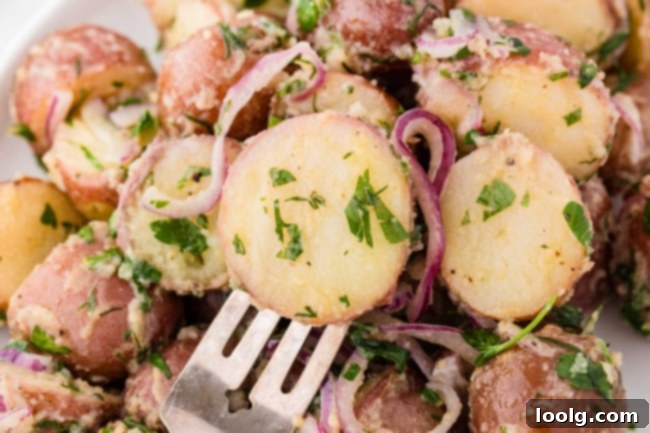 close-up of a fork poking a potato