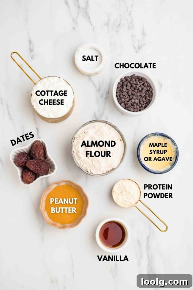 ingredients laid out to make cottage cheese cookie dough on a white table