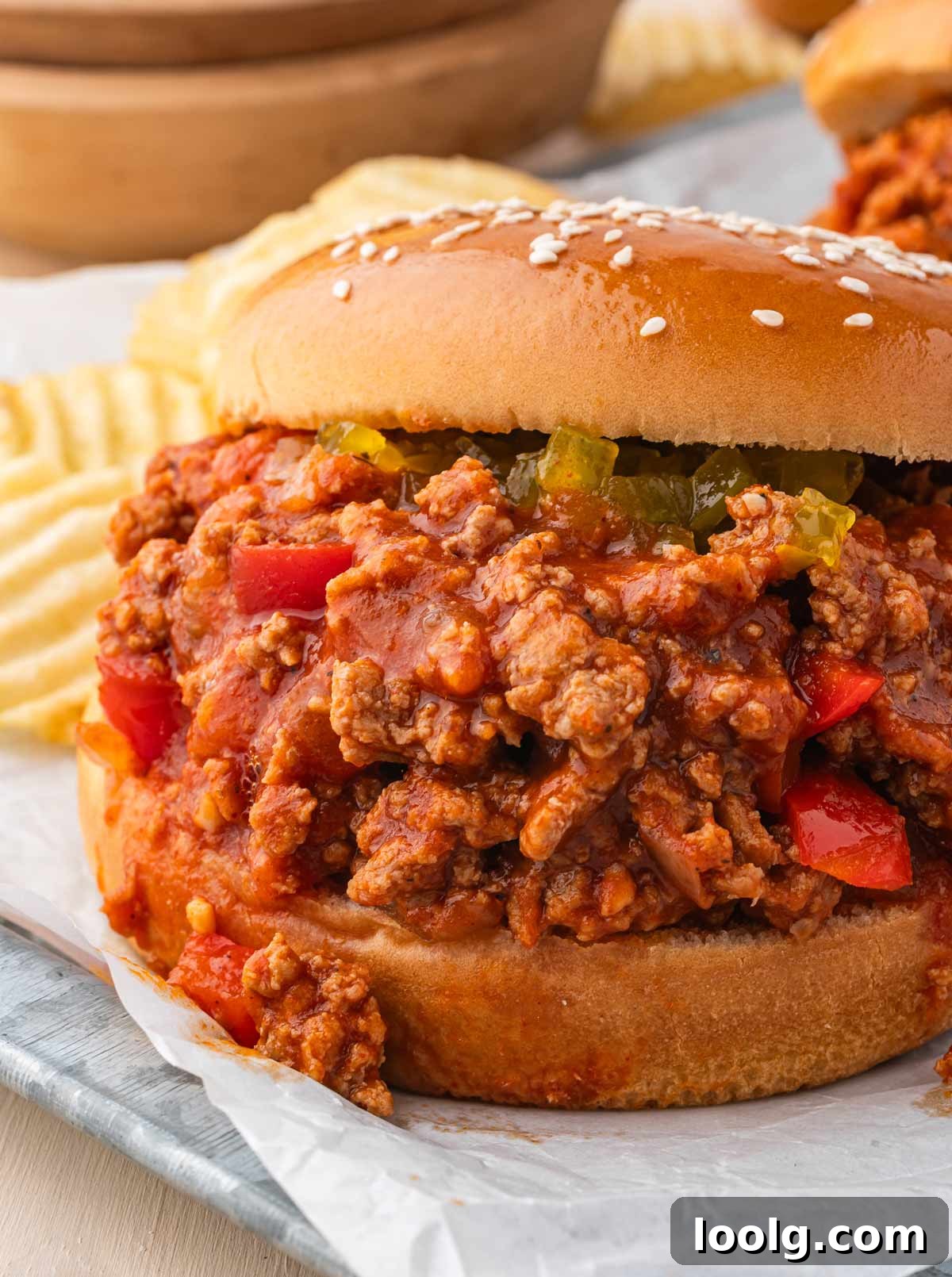 close-up of homemade ground turkey sloppy joes on a hamburger bun