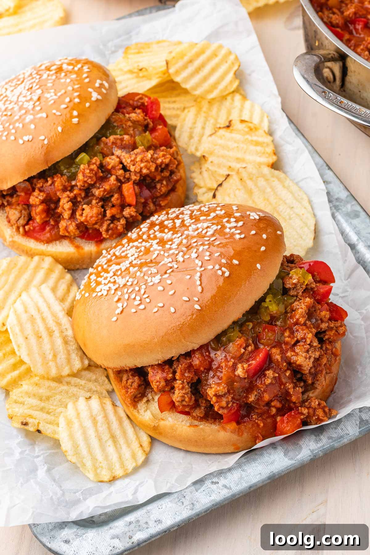 ground turkey sloppy joes served in a tray with chips